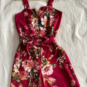 Woman, jumpsuit size M color, hot pink, and grate condition like new